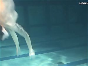 Lozhkova in witness thru shorts in the pool